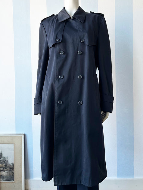 Donkerblauwe trenchcoat