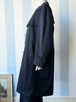 Donkerblauwe trenchcoat