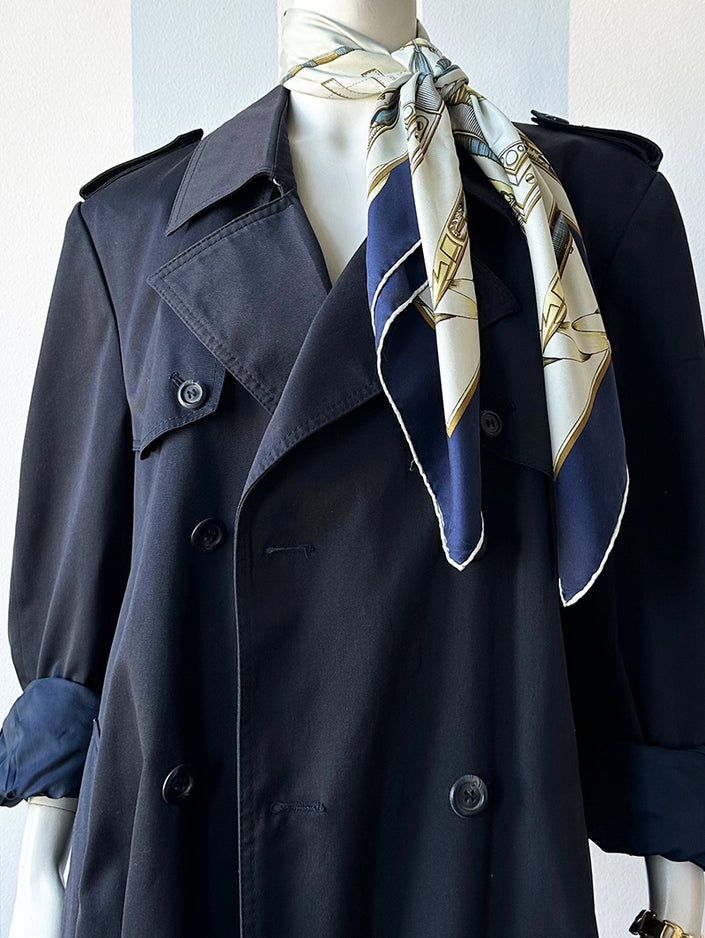 Donkerblauwe trenchcoat