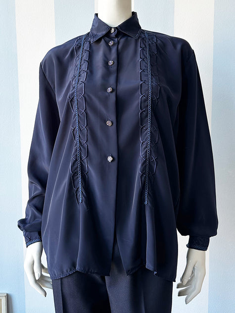 Donkerblauwe blouse met borduursels