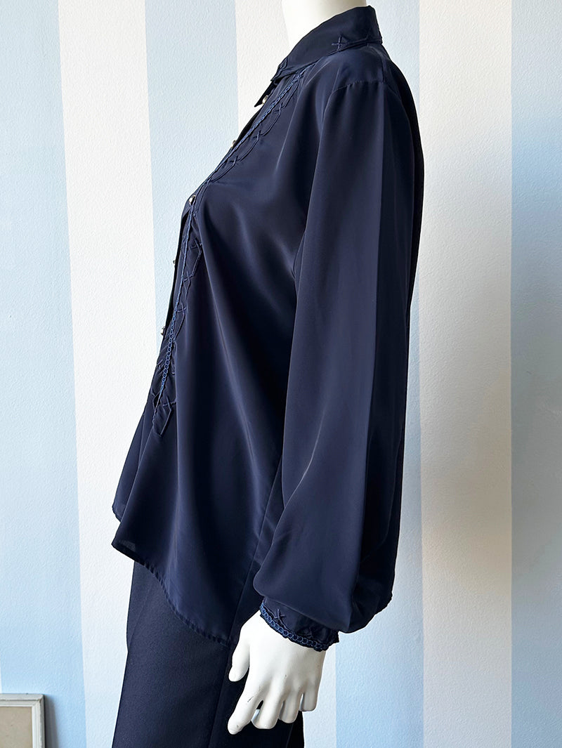 Donkerblauwe blouse met borduursels