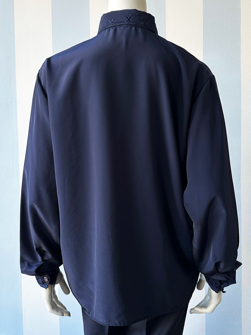 Donkerblauwe blouse met borduursels