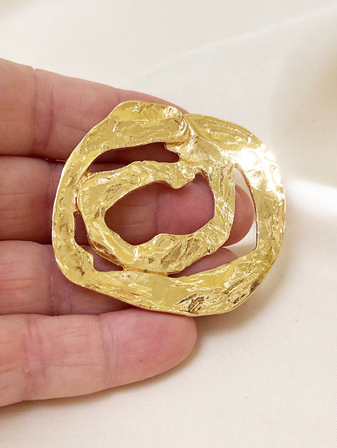 Vergulde designer broche