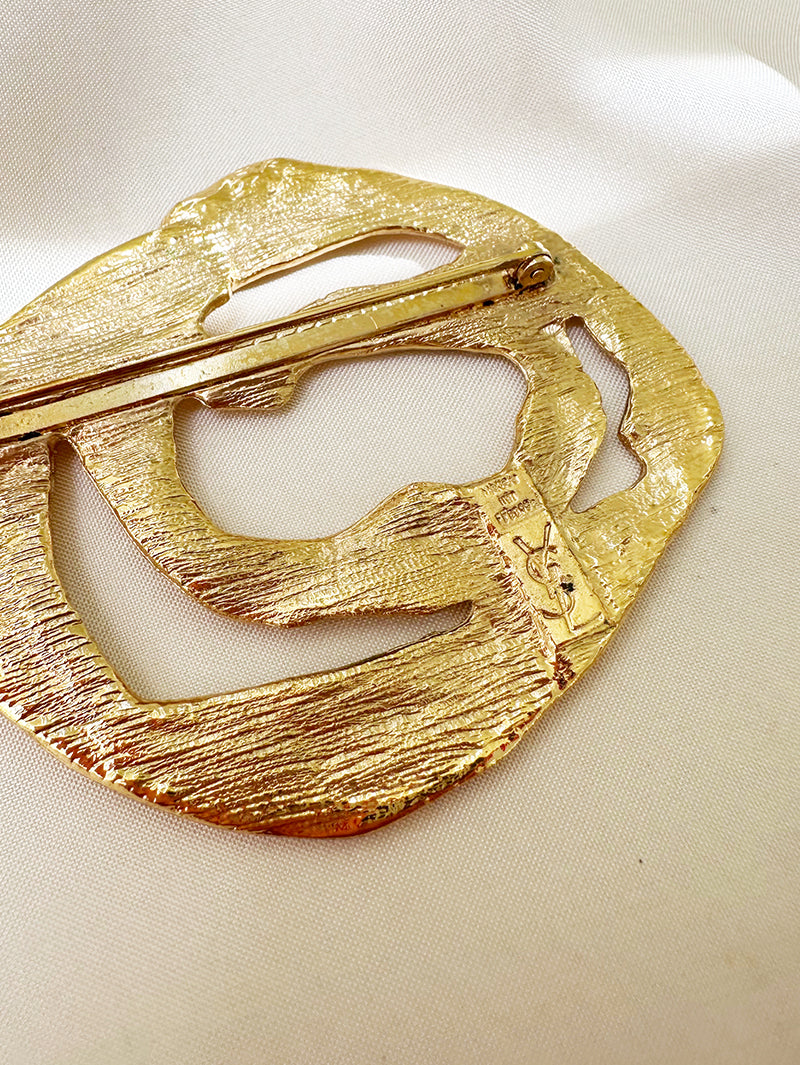 Vergulde designer broche