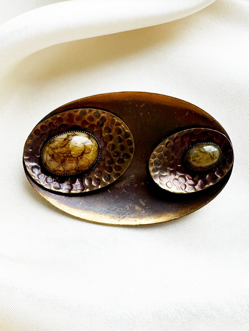 Koperen ovale broche