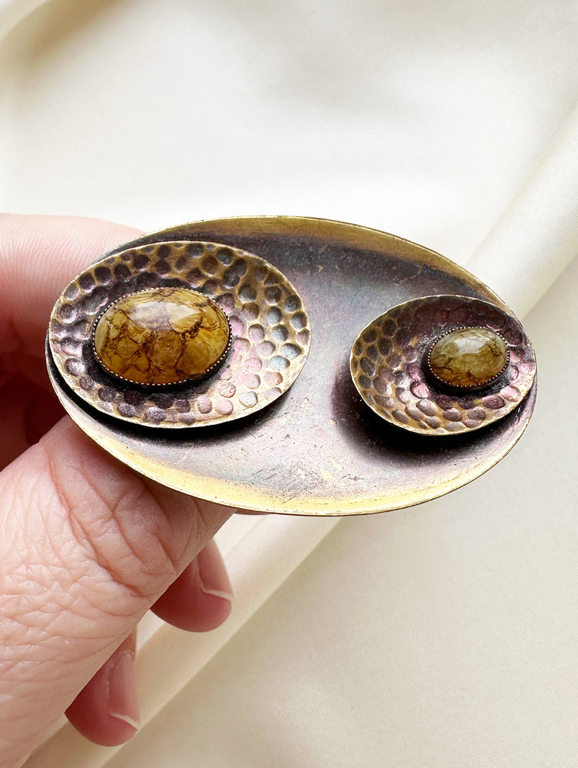 Koperen ovale broche