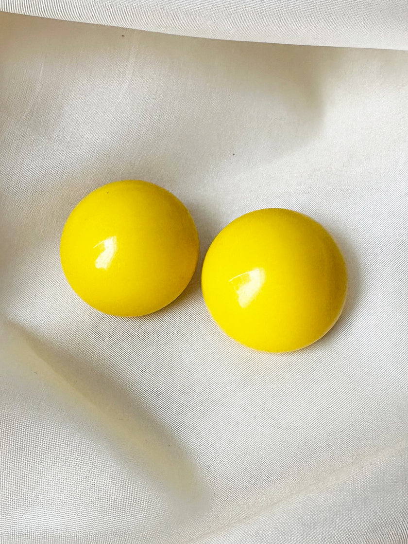 Knalgele clip oorbellen