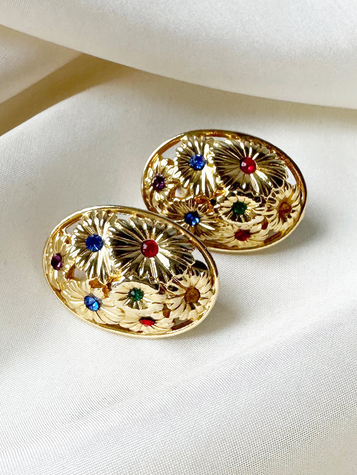 Ovale gouden floral clip oorbellen