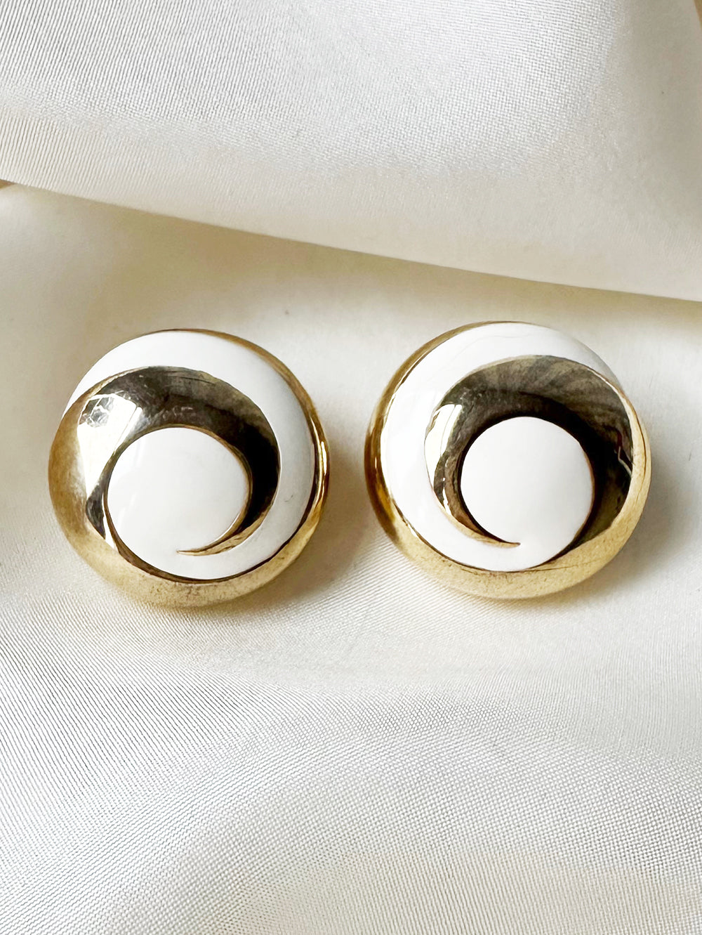 Gouden swirl clip oorbellen