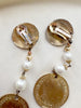 Gouden statement clip oorbellen