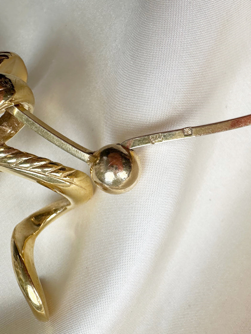 Vergulde ketting met ramhoofd