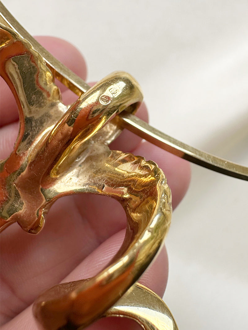 Vergulde ketting met ramhoofd