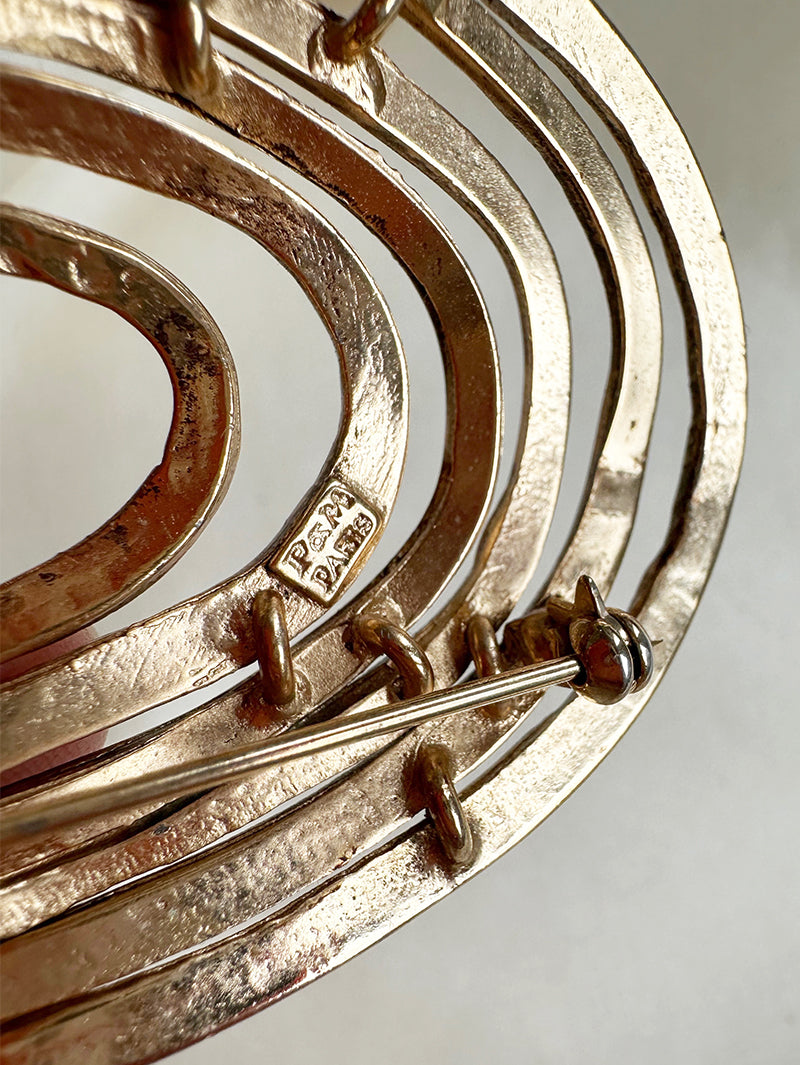 Grote vergulde designer broche