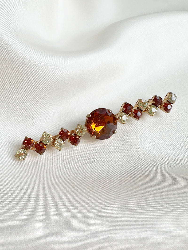 Lange strass broche