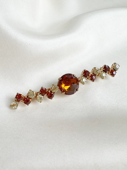 Lange strass broche