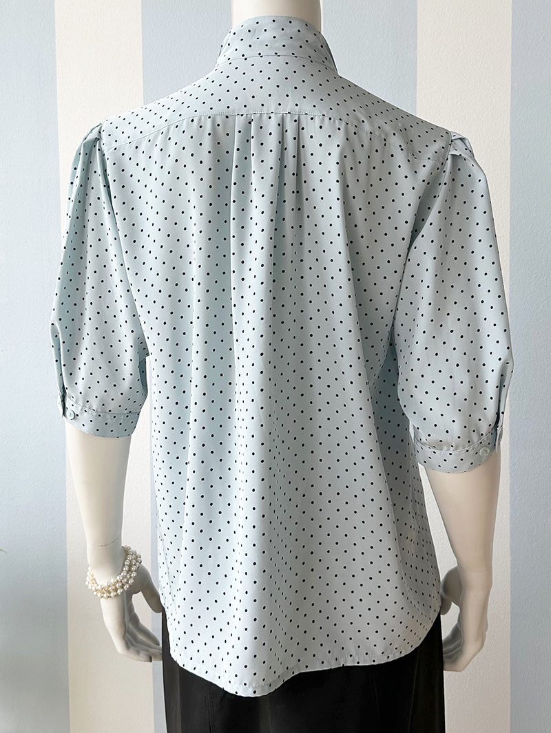 Lichtblauw polkadot strikblousje