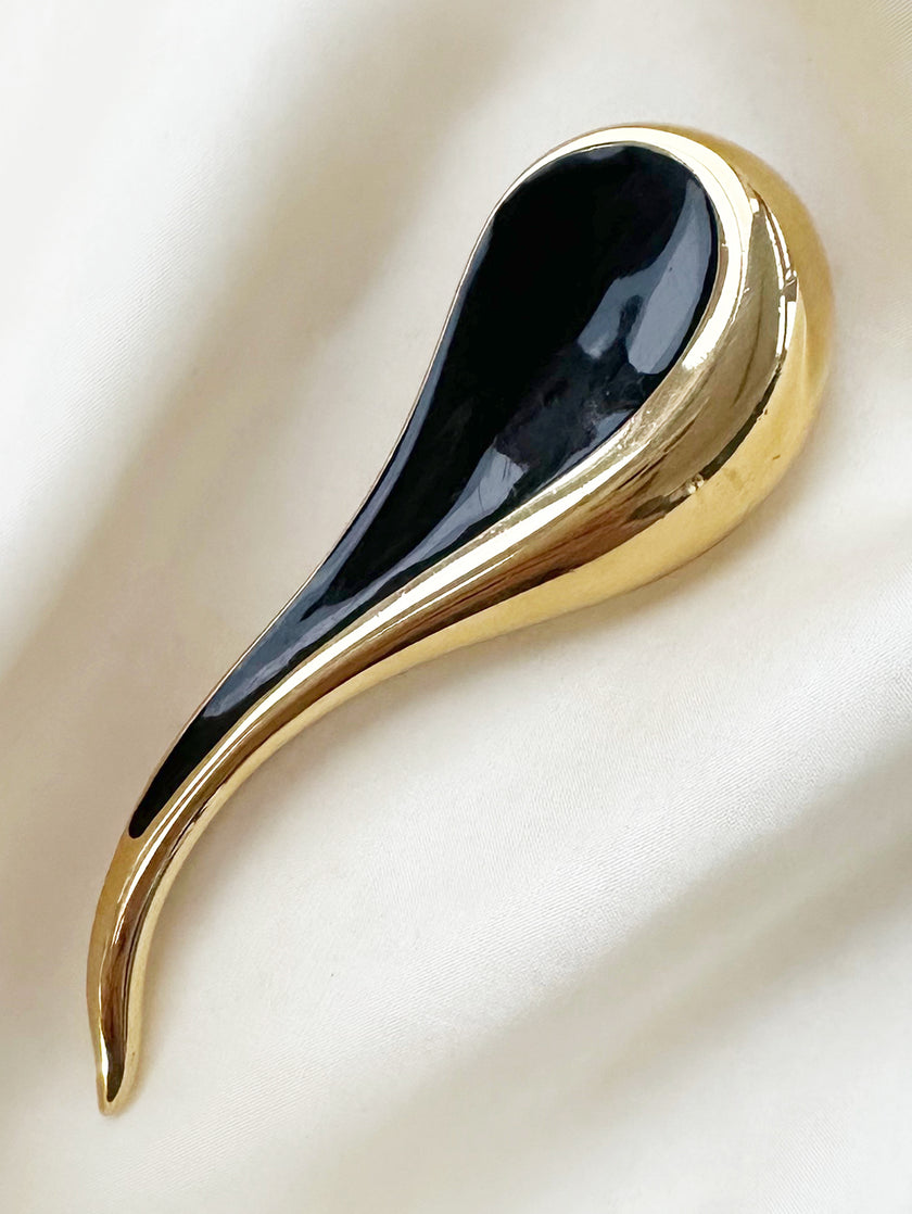 Grote goud/zwarte broche