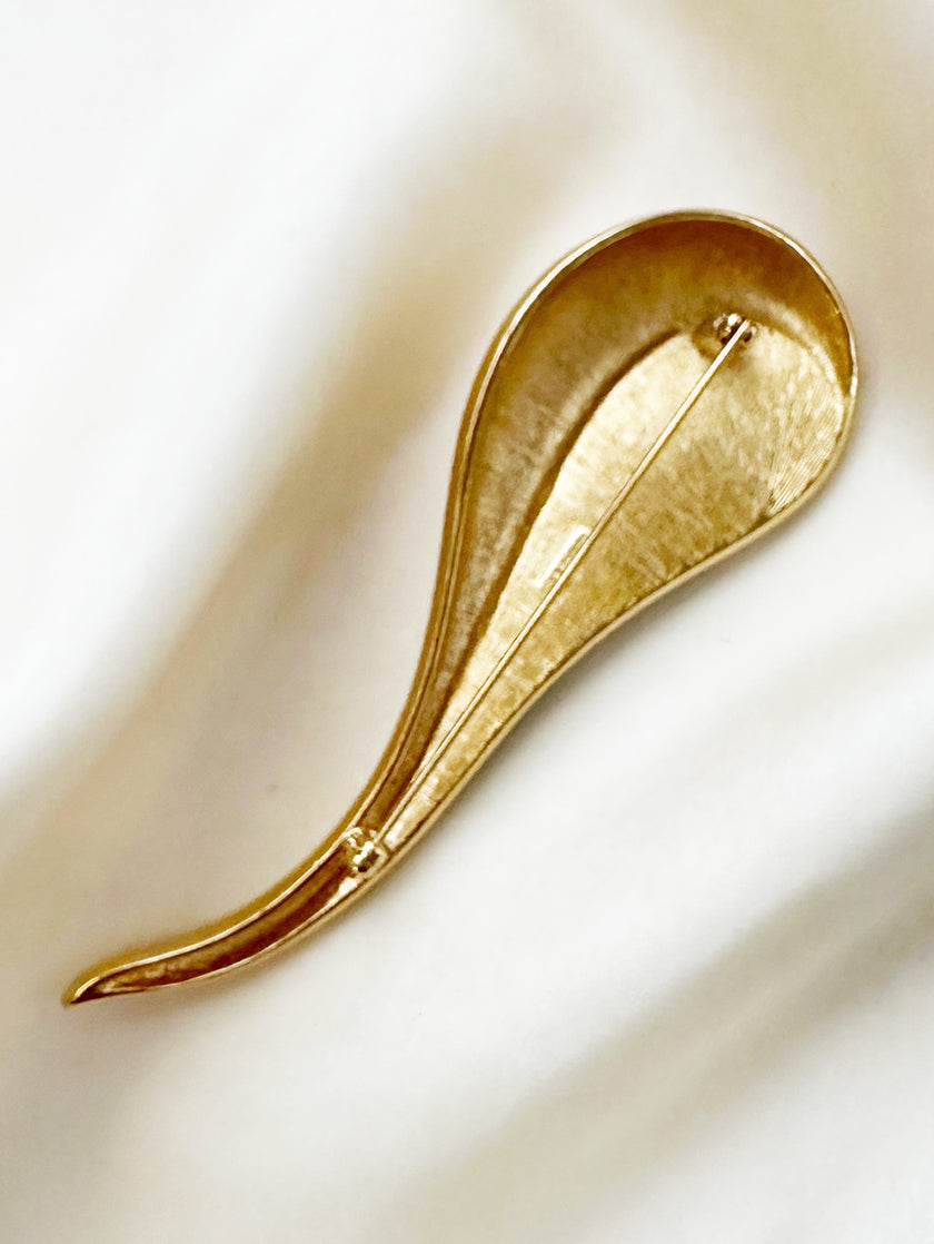 Grote goud/zwarte broche