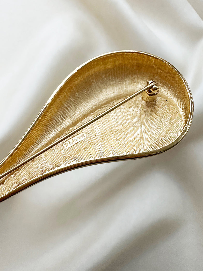 Grote goud/zwarte broche