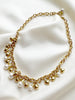 Gouden collier met bedels
