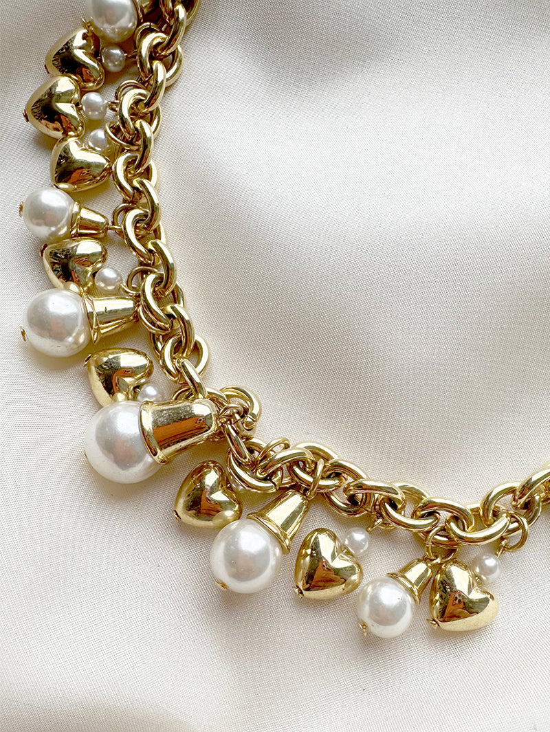 Gouden collier met bedels