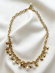 Gouden collier met bedels