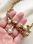 Gouden collier met bedels