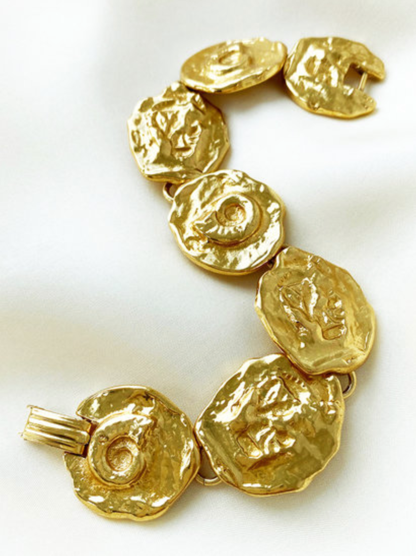 Vergulde schakelarmband met schelpjes