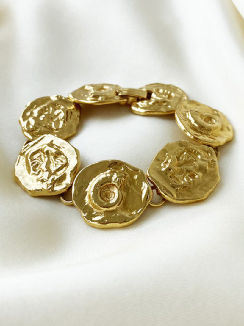 Vergulde schakelarmband met schelpjes