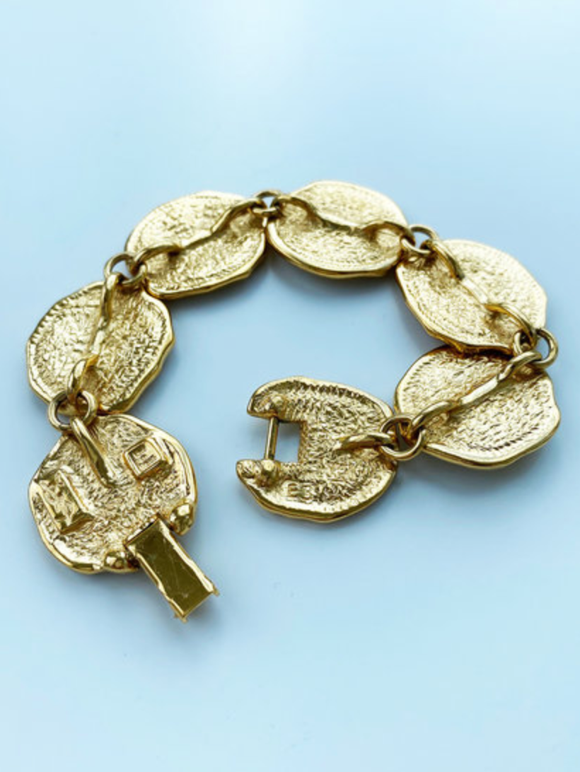 Vergulde schakelarmband met schelpjes