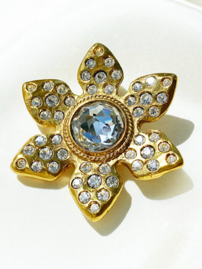 Vergulde designer broche