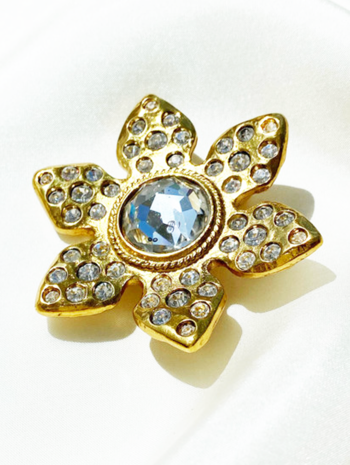 Vergulde designer broche