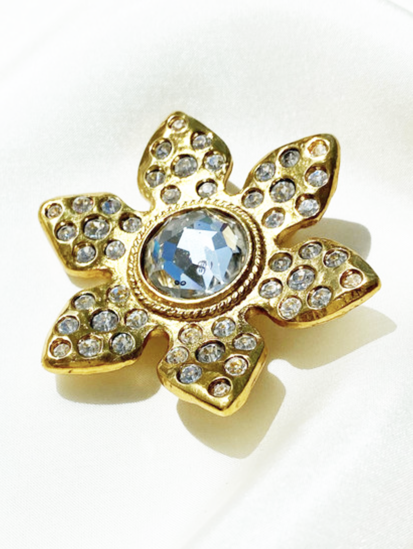 Vergulde designer broche