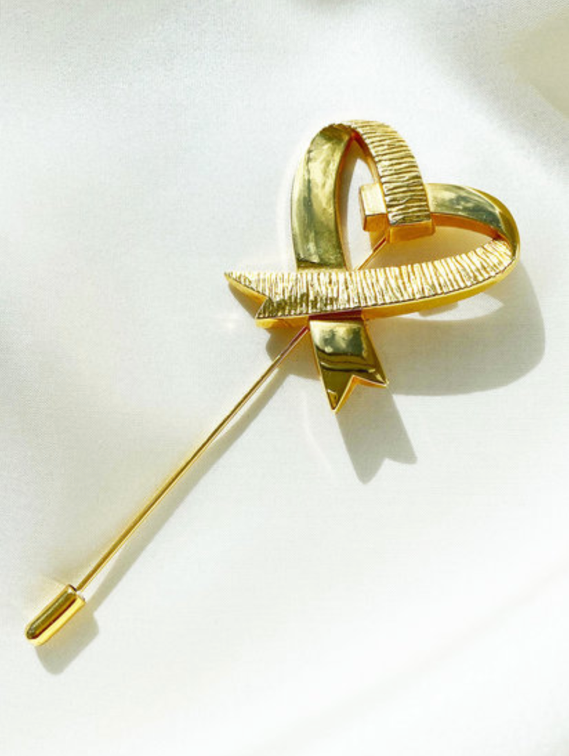 Vergulde dasspeld