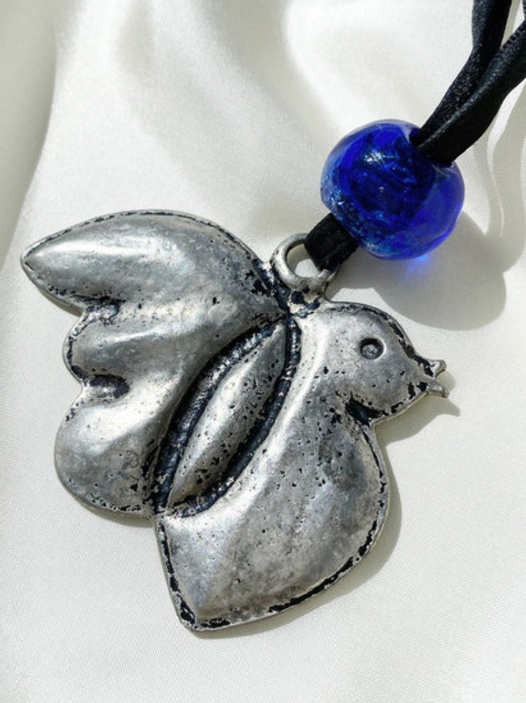 Verzilverde vogel ketting