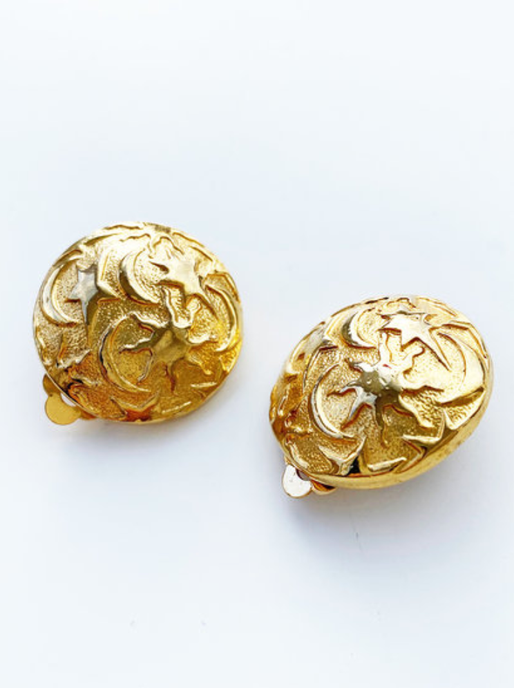 Ronde gouden sterrenhemel clip oorbellen